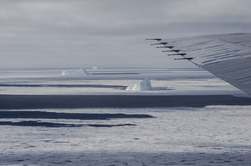 Flying in low altitude near some icebergs.